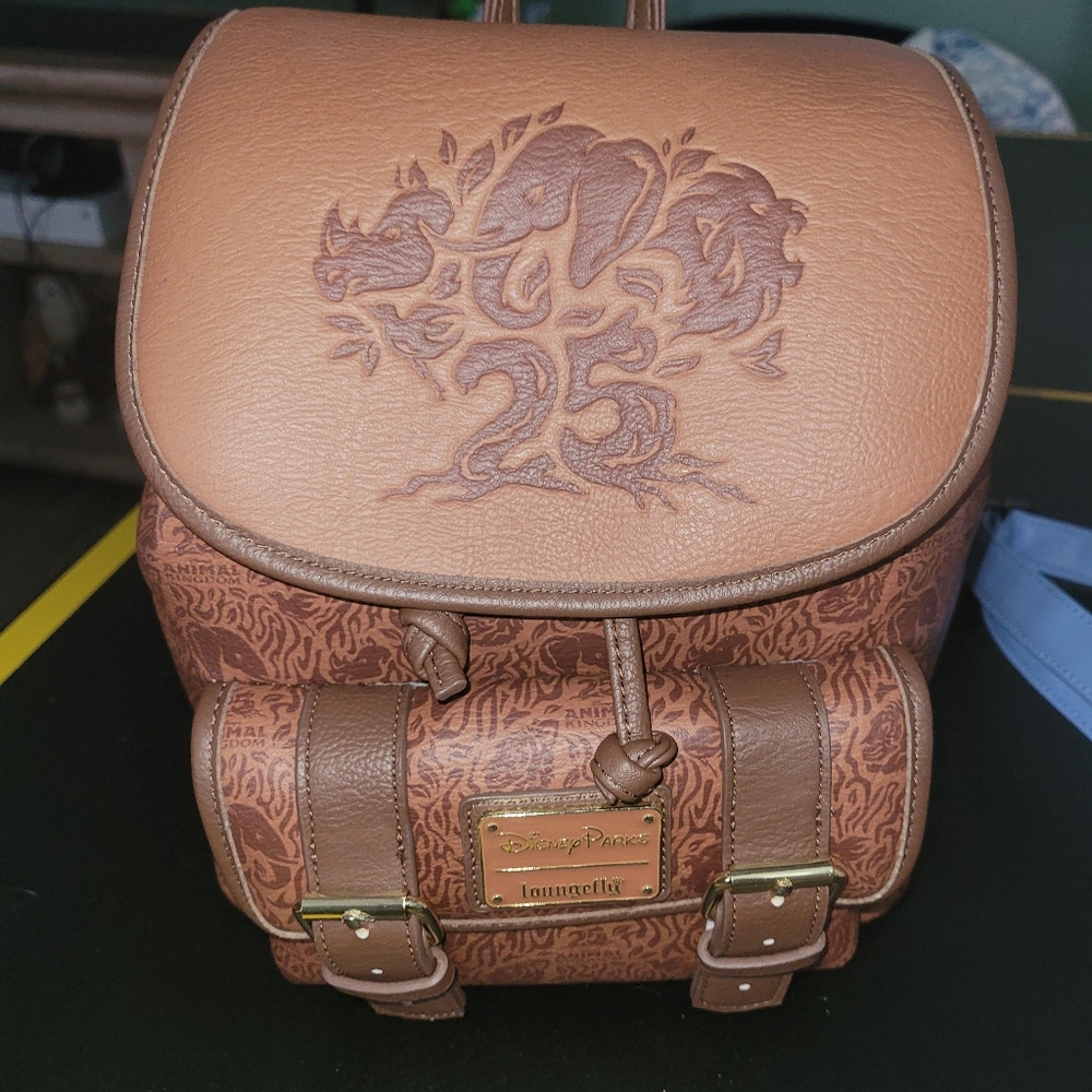 SOLD Loungefly 25th anniversary animal kingdom backpack sack